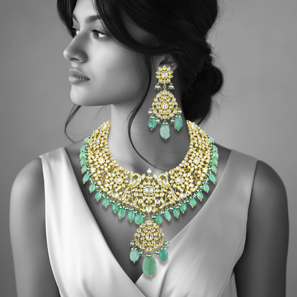 Polki Necklace Set with Gold Detailing and Emerald Drops