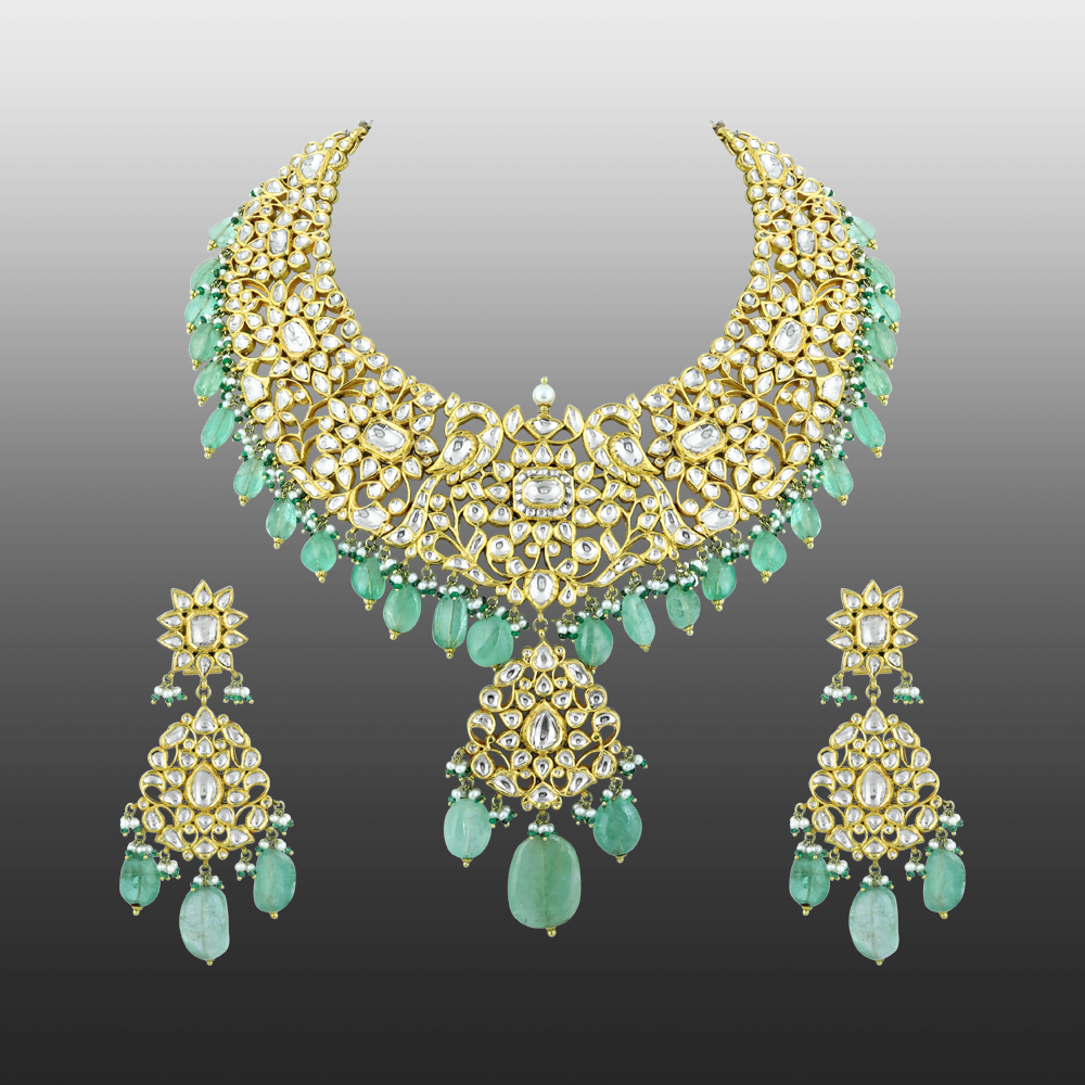 Polki Necklace Set with Gold Detailing and Emerald Drops