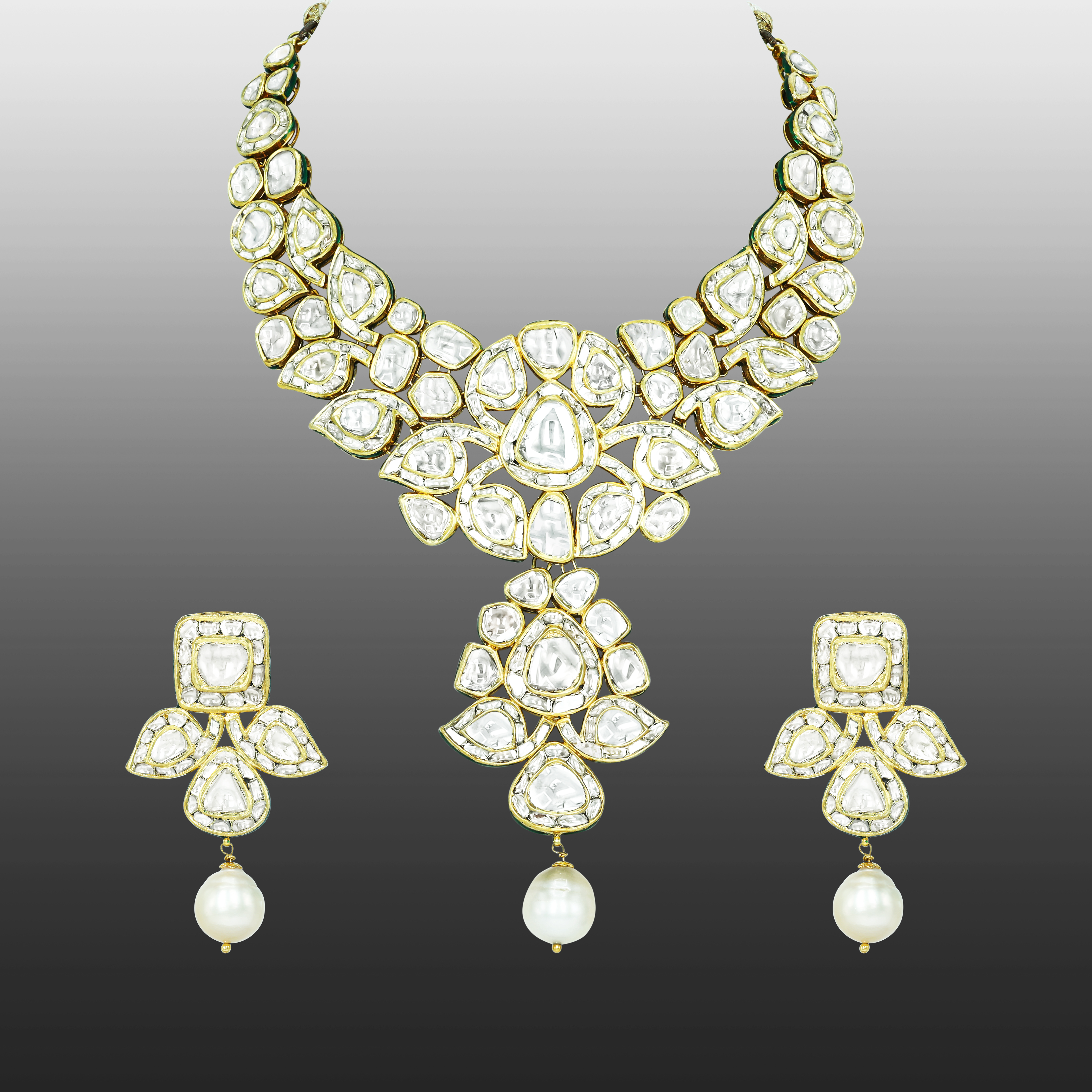 Asymmetrical Polki Necklace Set with Green Enamel and Pearl Drop