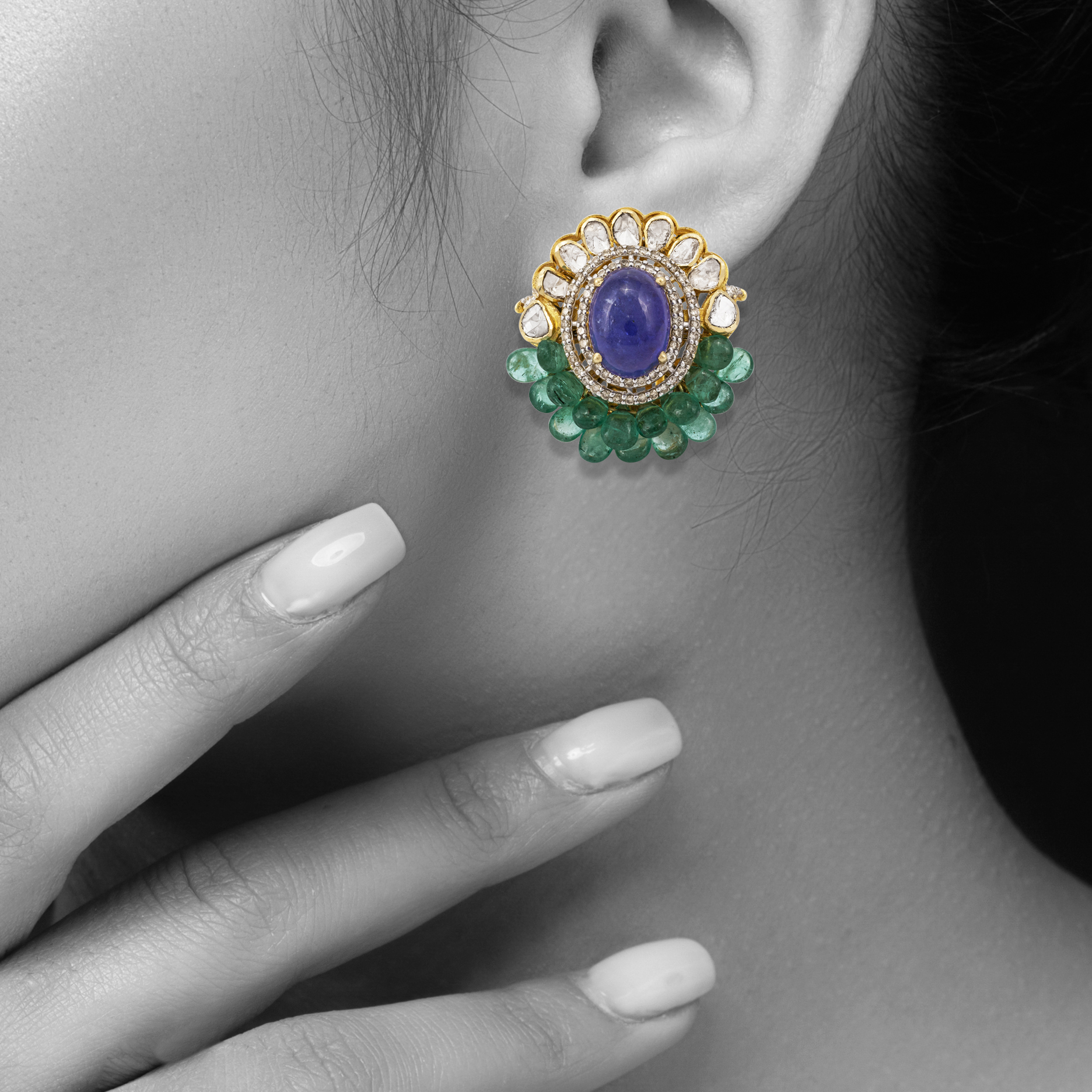 Oval Tanzanite Studs with Polki Half Border and Emerald Beads