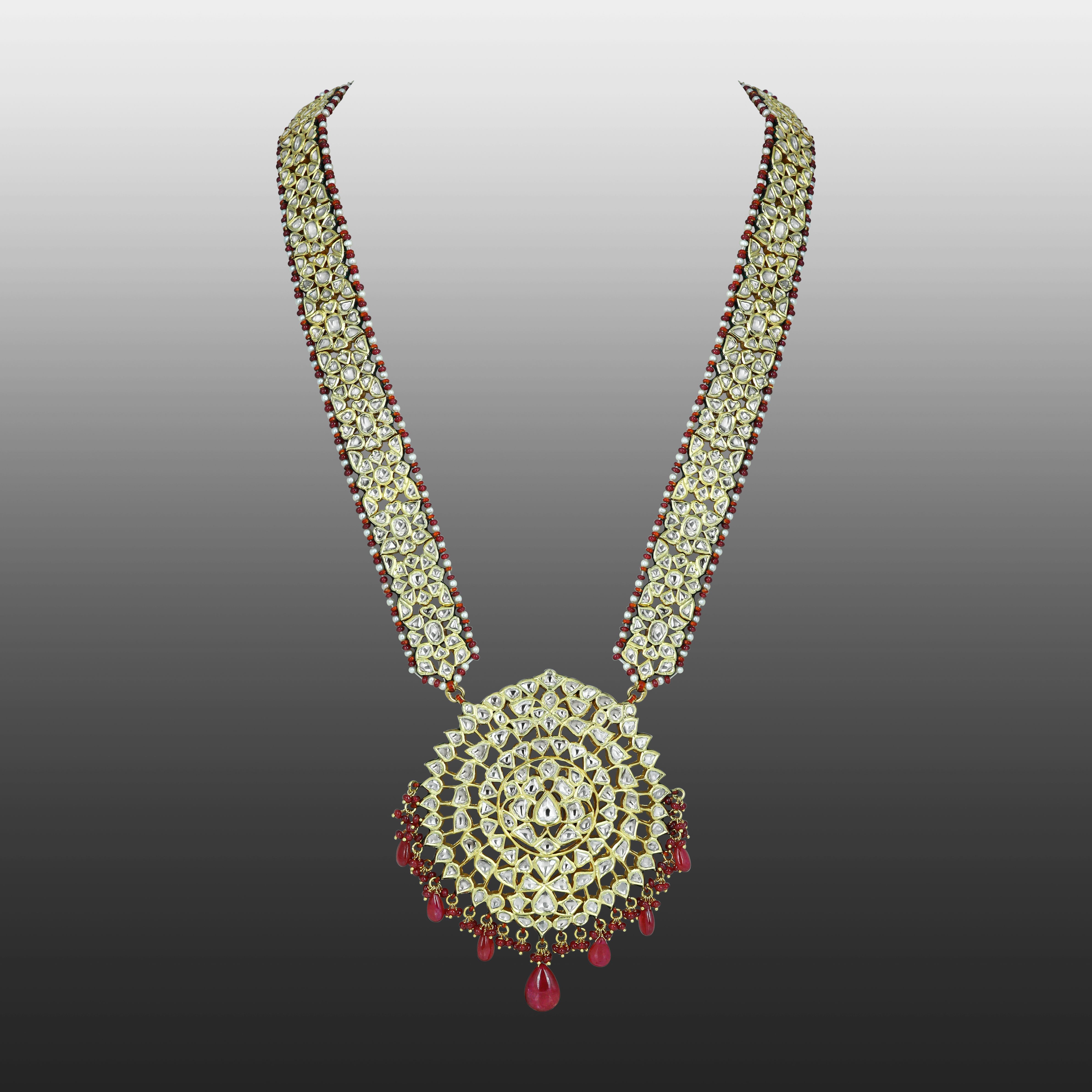 Polki Patri Haar Necklace with Spiral Pendant and Ruby Drops