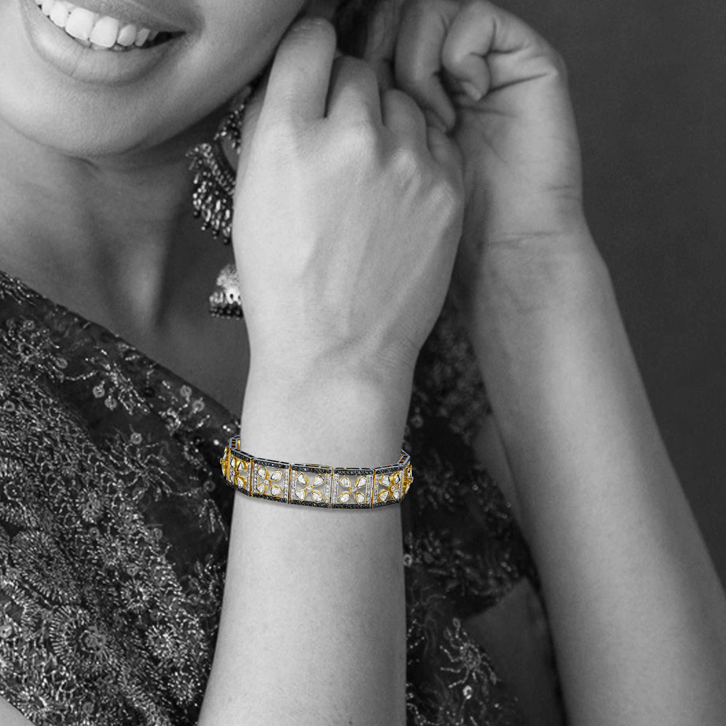 Tennis Bracelet with Floral Polkis and Black Diamond Border